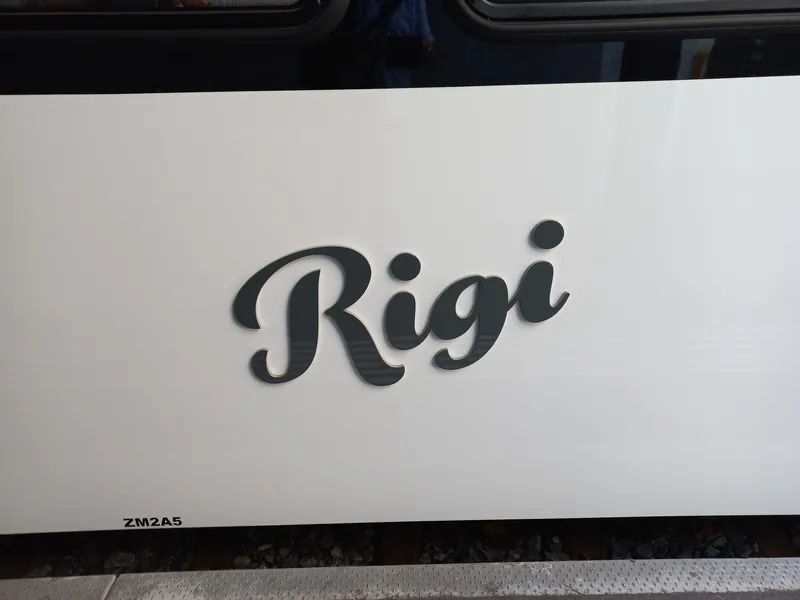 Rack railway Vitznau to Rigi (Kulm)-railway station Vitznau-Logo on train-04ASD (2023-09-04)