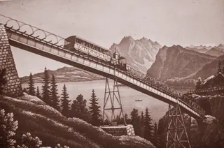 Drawing of a steam train of the Vitznau-Rigi Railway (VRB) on the Schnurtobel bridge below the Grubisbalm station (unbekannt)