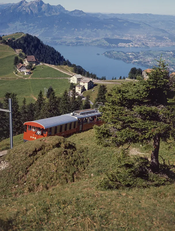 Between Rigi-Staffel and Rigi-Kulm, Vitznau-Rigi Railway (VRB) Bhe 2/4 railcar with a leading trailer (1975)