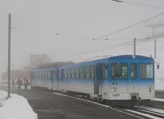Rail vehicles of Rigi Bahnen at Rigi Kulm train station (2010-03-28 14:48:55)