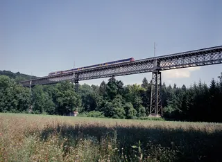 Railroad bridge at Ossingen (over the river Thur): 1: train 7955 at 14:33 from Winterthur, S 29 without lateral sun ; 2: train 7958 at 15:25 to Winterthur, S 29 with lateral sun ; 3: train 7959 at 15:33 from Winterthur, S 29 with lateral sun ; Chräbel in Goldau with Rigi steam loco 17 and BDhe 4/4 15 and driving trailer Bt 25 on downhill at 09:45 (25.07.2001-02.08.2001)