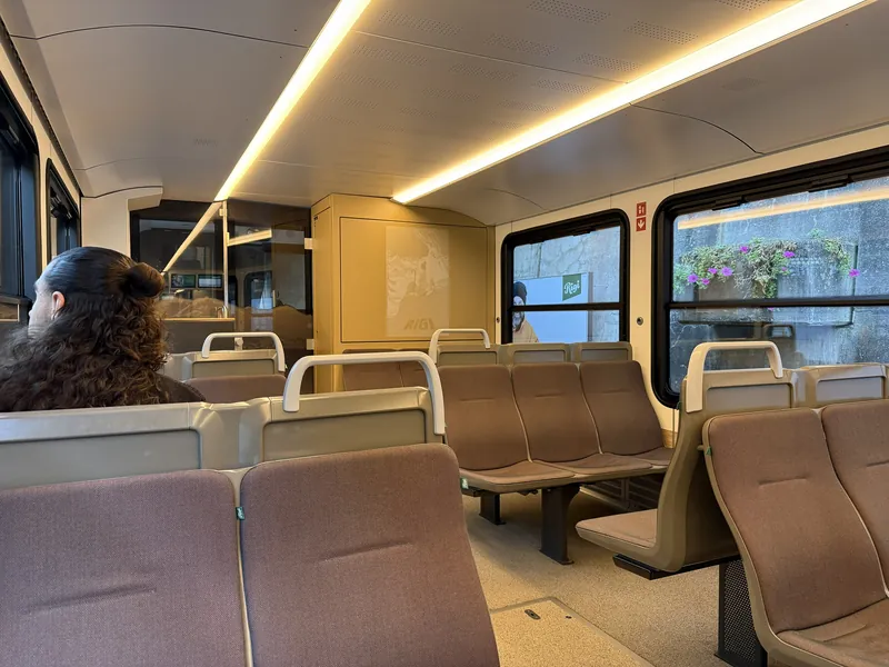 Interior of a Rigi Railways cogwheel train at Vitznau, 2026, 2026-09-30