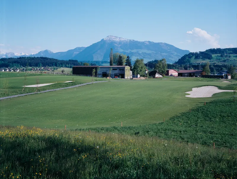 Risch ZG, On golf course southeast of Holzhäusern with the Kathrinenhof, in the background the Zugerberg, Buonas and Rigi (06.05.1996)